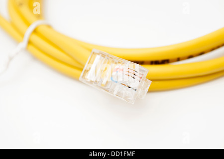 telephone cable yellow on a white background Stock Photo