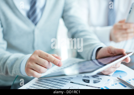 Close-up of businessman using touchpad Stock Photo