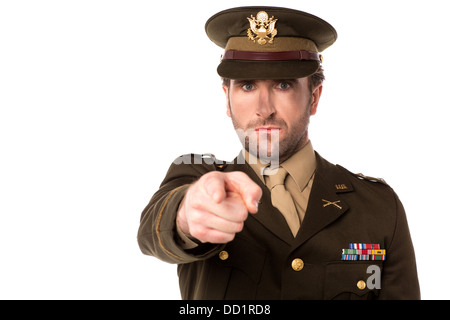 Soldier on white background pointing towards you Stock Photo