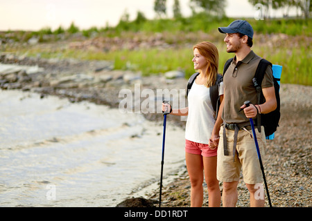 Portrait of couple of happy hikers enjoying their trip Stock Photo