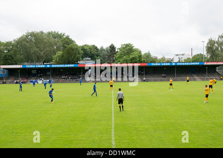 Stadion an der Feuerbach Street football ground, home to TuRU 1880 Dusseldorf (blue shirts) Stock Photo
