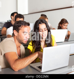 Two students talking in the classroom Stock Photo