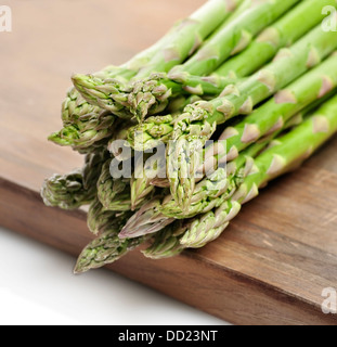 Fresh Green Asparagus On A Cutting Board Stock Photo