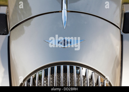 The bonnet and radiator grill of a metallic silver Morgan Aero, England Stock Photo