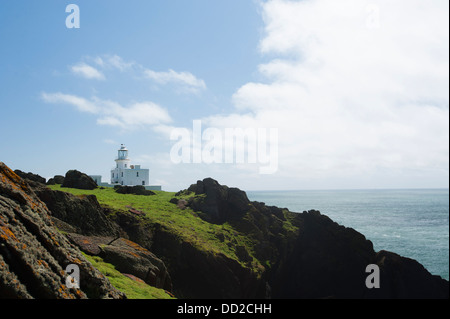 View along the cliffs towards Skokholm Lighthouse, South Pembrokeshire, Wales, United Kingdom Stock Photo