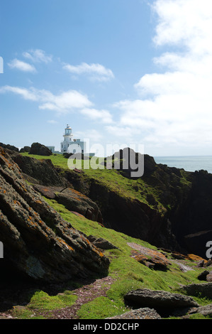 View along the cliffs towards Skokholm Lighthouse, South Pembrokeshire, Wales, United Kingdom Stock Photo