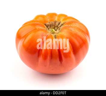 Fresh heirloom tomato isolated on white background Stock Photo