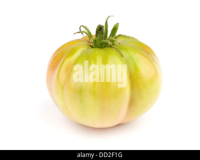 Fresh heirloom tomatoes isolated on white background Stock Photo