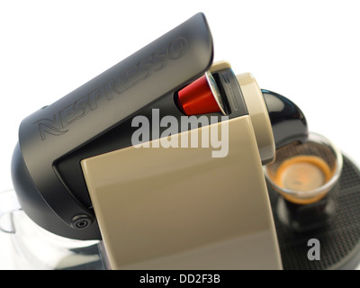 Nespresso coffee machine and red decaffeinato capsule Stock Photo