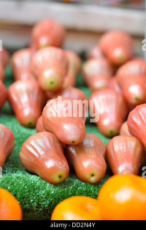 An Asian fruit variously called the wax apple, love apple, java apple, water apple, bell fruit and mountain apple. Stock Photo