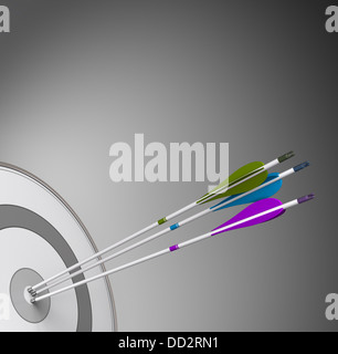 Three arrows hiting the center of a grey target with high precision. Concept image suitable for business excellence Stock Photo