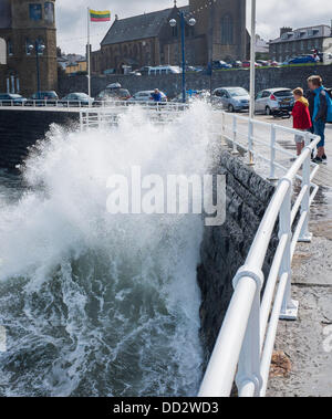 Aberystwyth Wales UK, Saturday 24 August 2013   Heavy seas a high tide and gusty winds bring waves crashing into the promenade at Aberystwyth on the August Bank Holiday weekend.   photo Credit: keith morris/Alamy Live News Stock Photo
