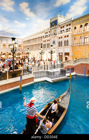 Gondolier and tourists on the Grand Canal in the Venetian Las Vegas Hotel Stock Photo