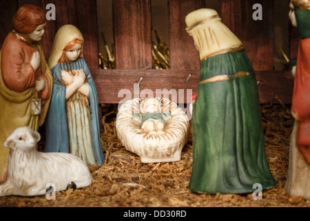 Closeup of figures from a nativity scene or set with Jesus Christ, Mary and Joseph Stock Photo