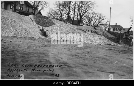 Photograph with caption Lake City breakwater, aggregate stock piles - - 282450 Stock Photo