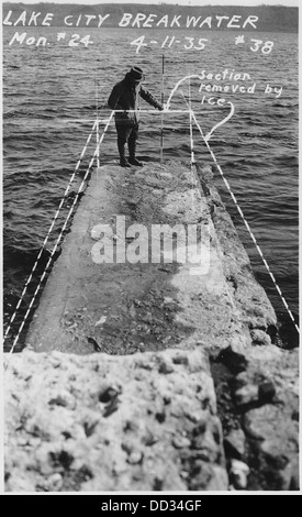 Photograph with caption Lake City breakwater...section removed by ice. - - 282448 Stock Photo