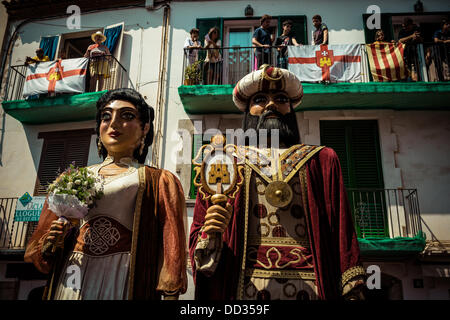 Sitges, Spain. August 24th, 2013: The giants of Sitges, costumed figures known as 'gegants', dance in the streets of Sitges during the Festa Major Credit:  matthi/Alamy Live News Stock Photo