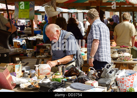 Shoppers visiting the outdoor flea market in Chesterfield town centre Stock Photo