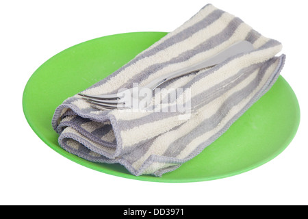 Tablecloth and two forks on a green plate isolated on white Stock Photo