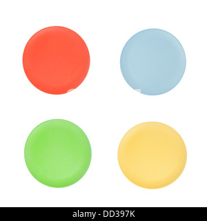 Four colorful plastic plates isolated on white Stock Photo