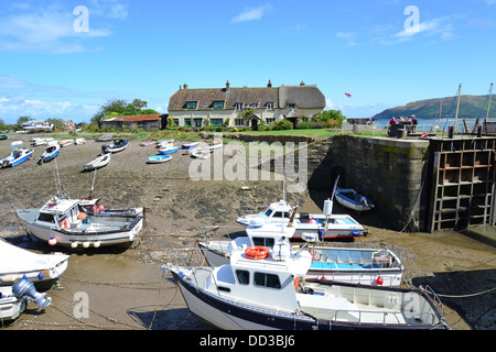 Cottages and boats by harbour, Porlock Weir, Porlock, Somerset, England, United Kingdom Stock Photo