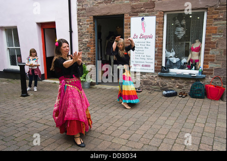 street performers dancers on the streets of Brecon during Brecon Jazz Festival 2013 Stock Photo