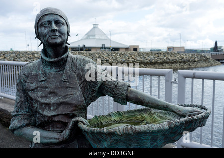 Fisher Woman statue Stornoway town centre and The Calmac Ferry Terminal in the background, Isle of Lewis Western Isles Scotland Stock Photo