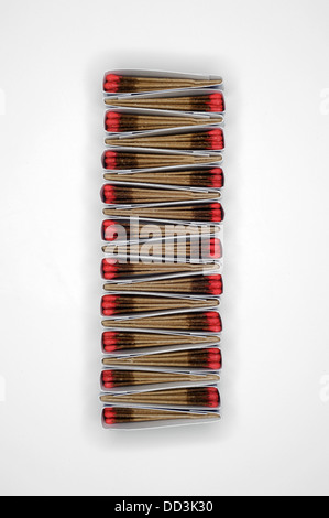 Packs of matches together forming a unique pattern. Long rectangular shape, white background Stock Photo