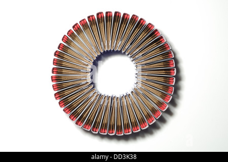 Packs of matches together forming a unique pattern. Circular shape, white background Stock Photo