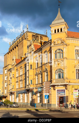 Old historic building lit by the sunset light on July 16, 2012 in Brasov, Romania. Stock Photo