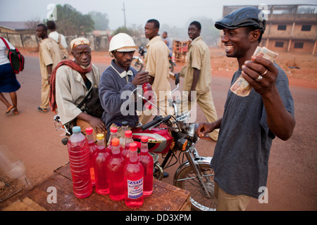 Petroleum sold by the bottle in Boké, Guinea, West Africa.
