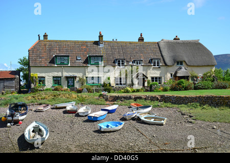 Cottages and boats by harbour, Porlock Weir, Porlock, Somerset, England, United Kingdom Stock Photo