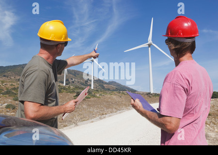 Technicians At A Windfarm Near Tarifa; Cadiz, Andalusia, Spain Stock Photo