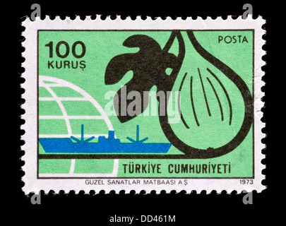 Postage stamp from Turkey depicting figs and a freighter. Stock Photo