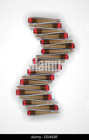 Packs of matches together forming a unique pattern. S shape, white background Stock Photo