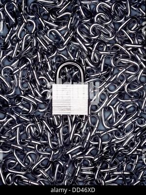 A metal padlock with metal chain. Stock Photo