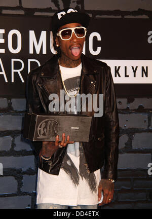 New York, New York, USA. 25th Aug, 2013. Rapper WIZ KHALIFA attends the red carpet during 'MTV 2013 Video Music Awards' held at the Barclays Center in Brooklyn, NY. Credit:  Nancy Kaszerman/ZUMAPRESS.com/Alamy Live News Stock Photo