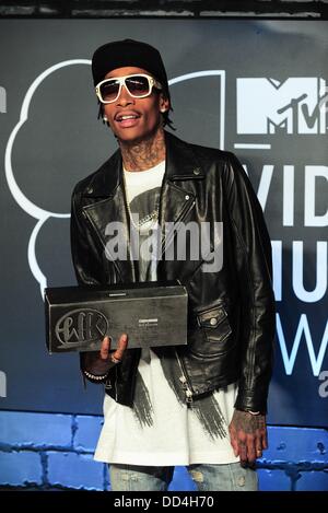 Brooklyn, NY. 25th Aug, 2013. Wiz Khalifa at arrivals for MTV Video Music Awards - 2013 VMAs - Part 2, Barclays Center, Brooklyn, NY August 25, 2013. Credit:  Gregorio T. Binuya/Everett Collection/Alamy Live News Stock Photo