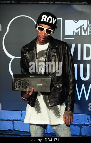 Brooklyn, NY. 25th Aug, 2013. Wiz Khalifa at arrivals for MTV Video Music Awards - 2013 VMAs - Part 2, Barclays Center, Brooklyn, NY August 25, 2013. Credit:  Gregorio T. Binuya/Everett Collection/Alamy Live News Stock Photo