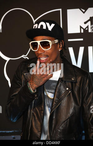 Brooklyn, New York, USA. 25th Aug, 2013. US rapper Wiz Khalifa arrives on the red carpet for the MTV Video Music Awards at the Barclays Center in Brooklyn, New York, USA, 25 August 2013. Photo: Hubert Boesl/dpa/Alamy Live News Stock Photo