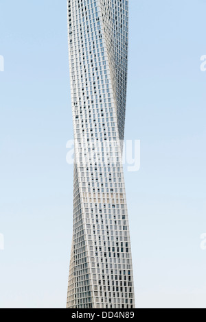 View of new Cayan Tower a modern skyscraper with twisted design in Marina district of Dubai UAE Stock Photo