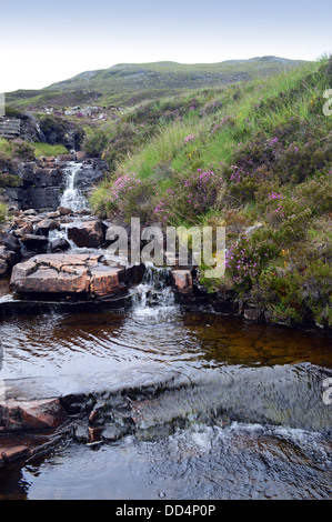 A series of small waterfalls flowing into Loch Home from the Scottish Mountain Scottish Mountains Beinn Enaiglair (a Corbett ). Stock Photo