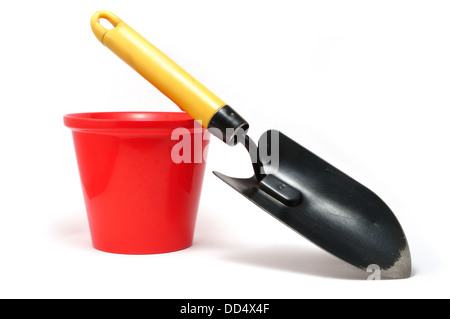 Garden Trowel and Red Ceramic Flower Pot Isolated On A White Background Stock Photo
