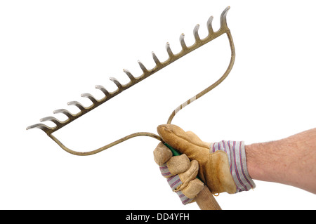 Gardener Holding a Garden Rake garden tools Isolated On White Stock Photo