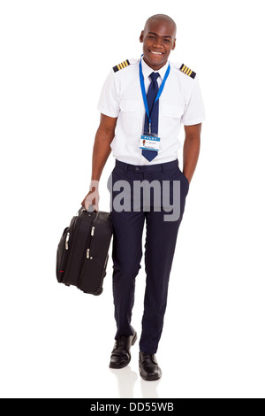 happy young airline pilot carrying briefcase isolated on white background