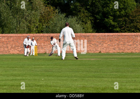 Attenborough Village Cricket Club, Nottinghamshire, UK, August 26th. Following the Opening of the Attenborough village cricket club's improved pavilion by Paul Johnson, former star player for Nottinghamshire County Cricket Club, a celebration match was held between a team of past team members and the current team. Stock Photo