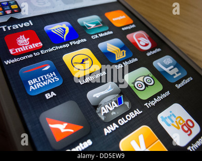 Detail of many travel and airline apps on an iPhone 5 smart phone Stock Photo