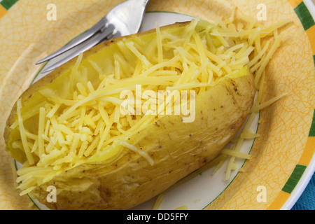 Jacket potato with cheese, close up Stock Photo