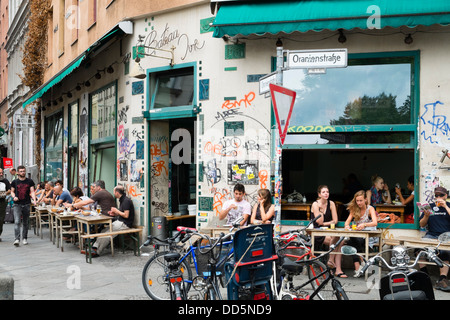 Cafe on Oranienstrasse in bohemian district of Kreuzberg in Berlin Germany Stock Photo