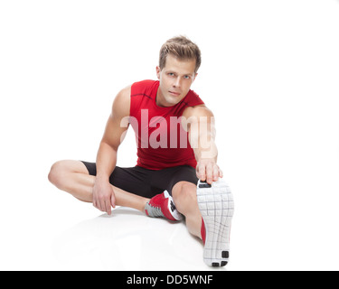 Stretching after exercise Stock Photo
